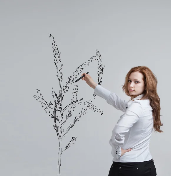 Vrouw tekening plant — Stockfoto