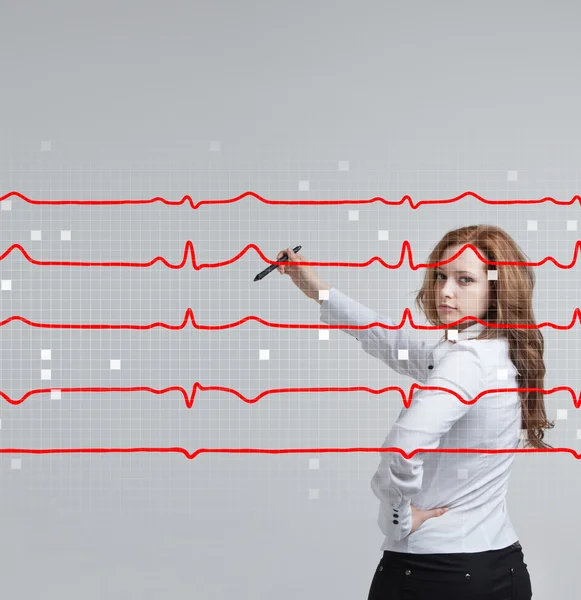 Doctor woman drawing cardiogram — Stock Photo, Image