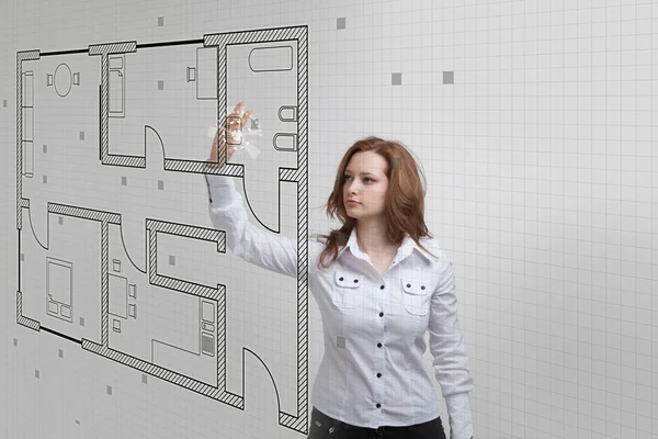 Vrouwelijke architect werken met een virtueel appartement plan — Stockfoto