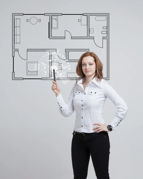 Vrouwelijke architect werken met een virtueel appartement plan — Stockfoto