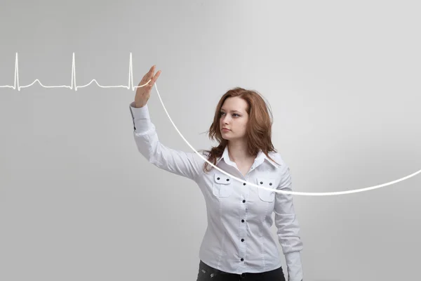 Medico donna e linee cardiografiche — Foto Stock