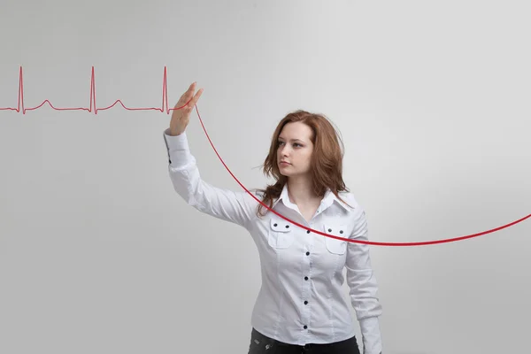 Doctor woman and cardiogram lines — Stock Photo, Image