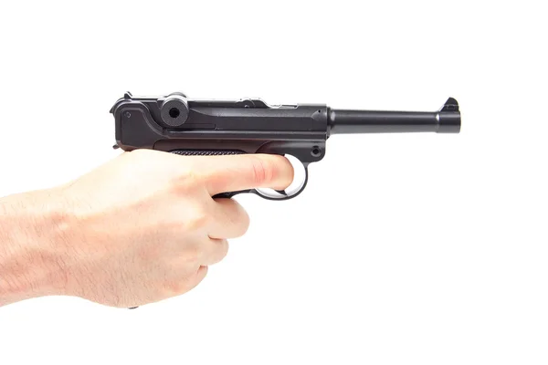 Mans hand som håller gun, isolerad på vit. — Stockfoto