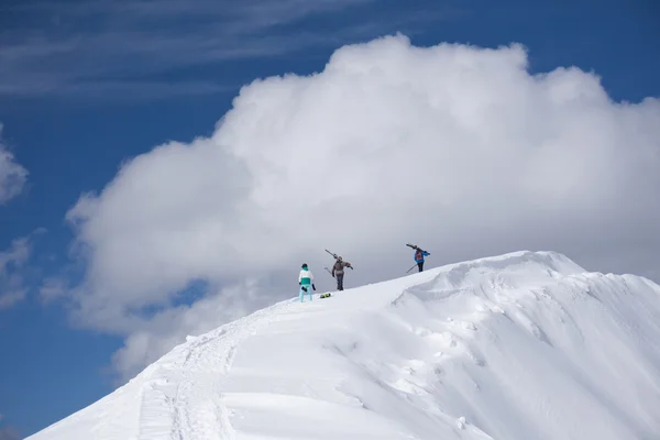 Skiers walking uphill for freeride — Stock Photo, Image