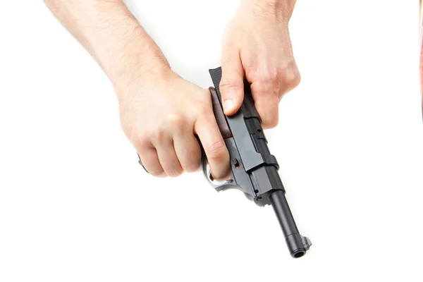 Mans hand som håller gun, isolerad på vit. — Stockfoto