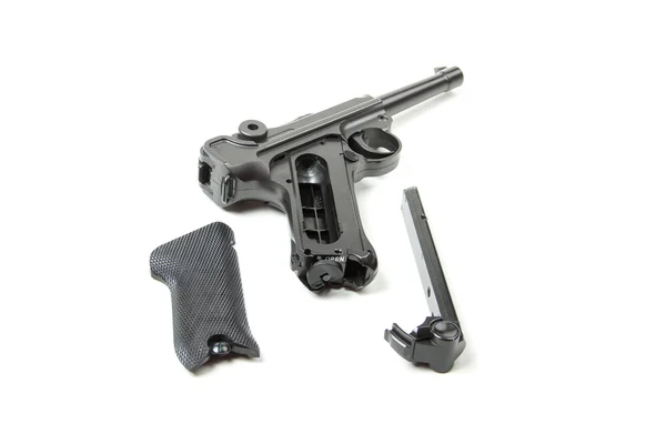 Zdemontowany pistolet, na białym tle — Zdjęcie stockowe