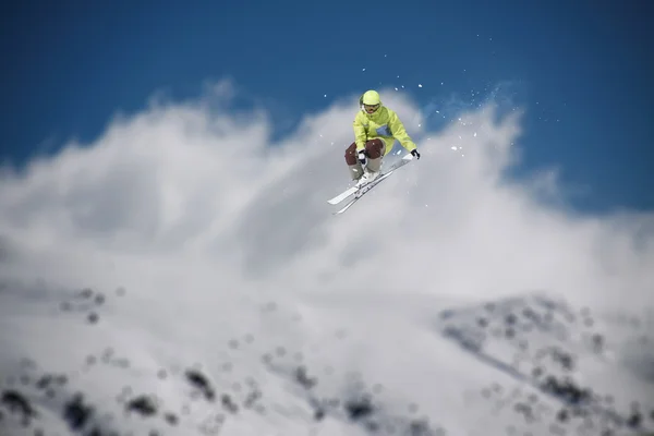 Flying skier on mountains. Extreme sport. — Stock Photo, Image