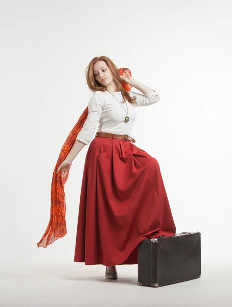 Woman in skirt dancing with a red handkerchief — Stock Photo, Image