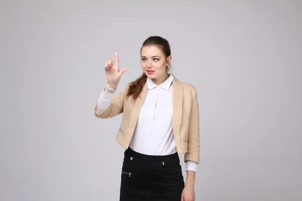 Woman presses a virtual button — Stock Photo, Image