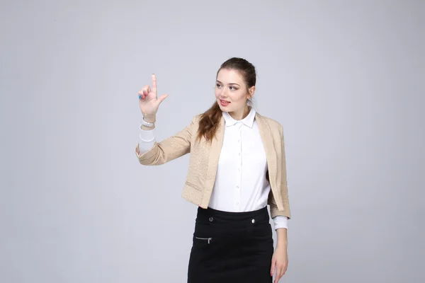 Woman presses a virtual button — Stock Photo, Image