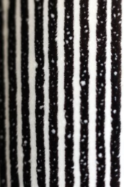 Siyah beyaz çizgili çizgili yüzeyin soyut arkaplanı, makro