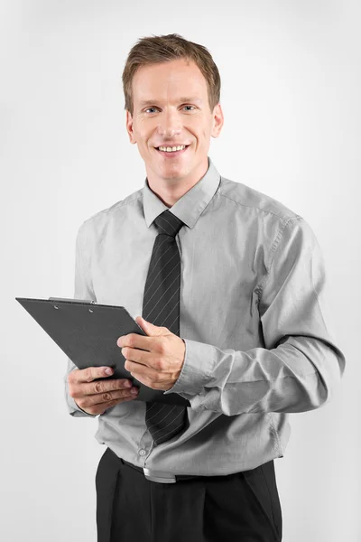 Business man with clipboard — Stock Photo, Image