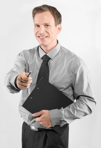 Homem de negócios com área de transferência — Fotografia de Stock