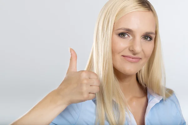 Woman showing thumb up sign — Stock Photo, Image