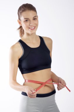 Ölçüm bandı olan kadın