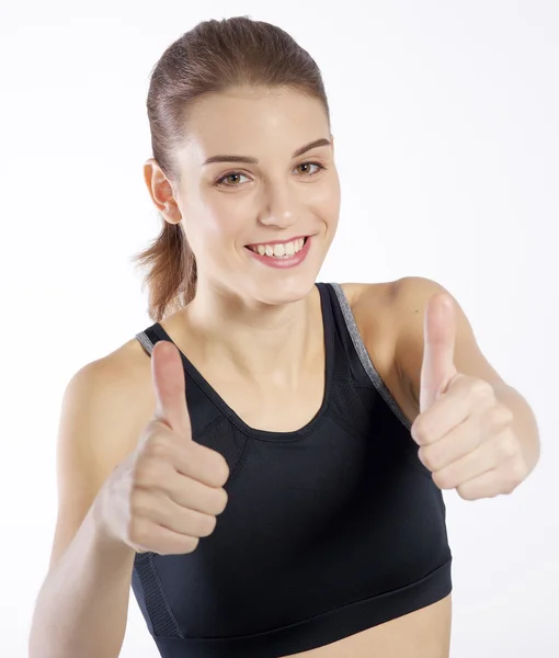 Mujer mostrando pulgares hacia arriba — Foto de Stock