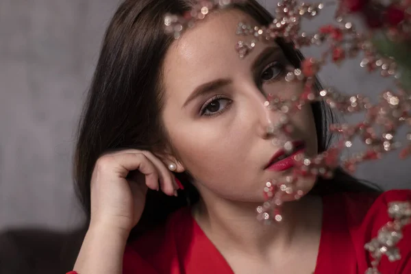 Portrait Attractive Brunette Woman Red Blouse Decorative Sparkling Red Branches — Stock Photo, Image