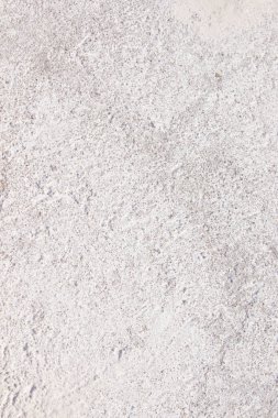 Taş beton duvar dokusu. Çatlak kum tuğlası. Pastel arkaplan sağlam. 