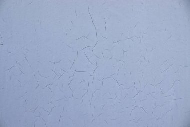 Boya katmanlı eski mavi bir duvar. Arka plandaki doku. Tuval üzerine yağlı boya. kopyalama alanı. Tasarım için pankart.