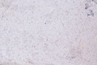 Beyaz çimento. Taş beton dokusu, kaya alçılı duvar. Çatlak kum tuğlası. Pastel zemin beyaz, gri, katı tahıl zemin