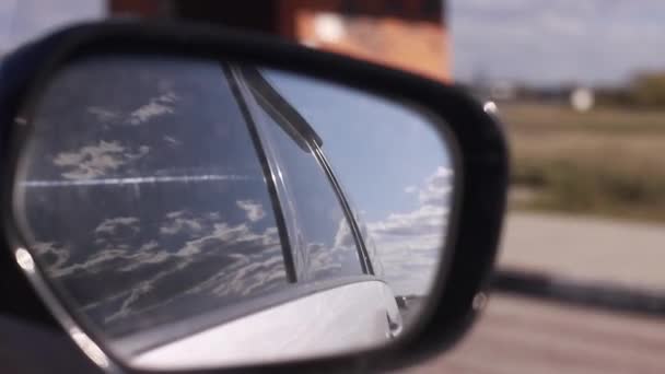 Close Motioned View Car Rear View Side Mirror Clouds Field — Stock video