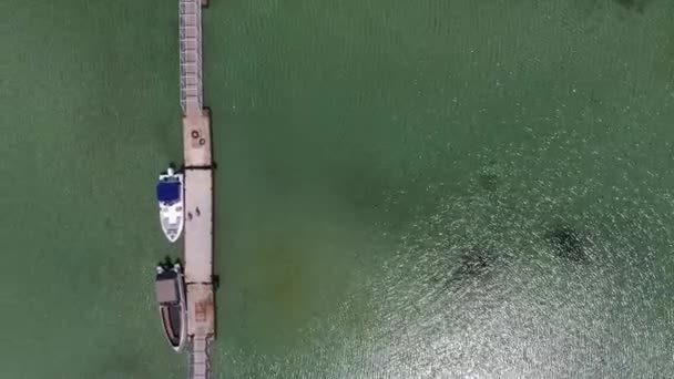 Birds Eyes View Tourists Run Pier Yacht Departs Island Berth — Stock Video
