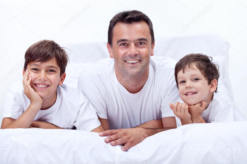 Father and his sons having boys time together