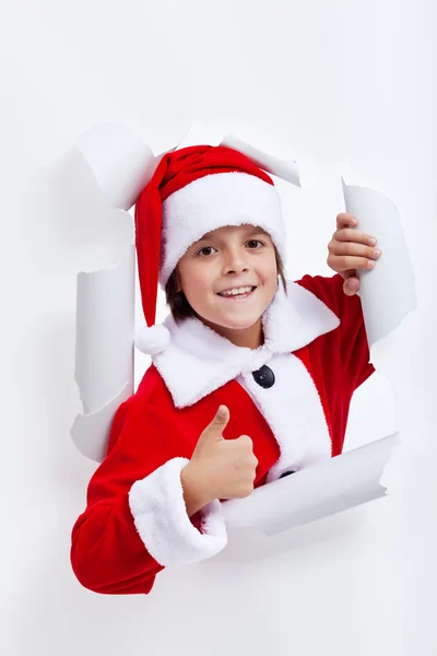 Happy boy opening christmas season — Stock Photo, Image