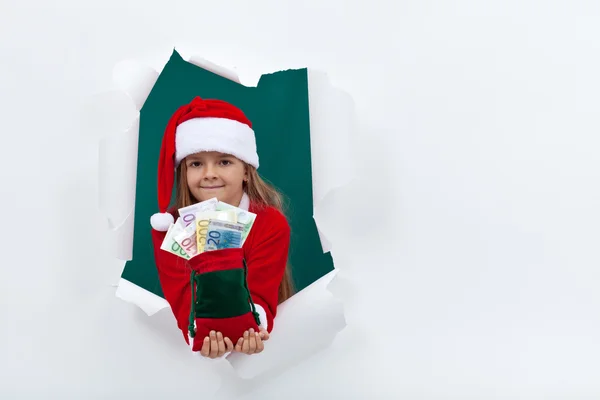 Little santa giving you money for the holiday season — Stock Photo, Image