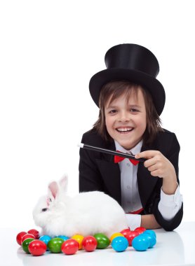 The magic of easter - happy magician boy and grumpy rabbit clipart