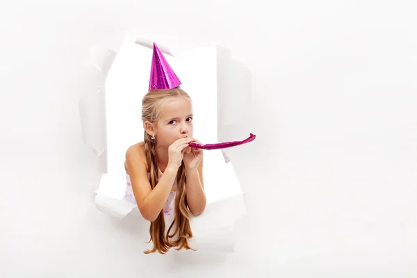 Little party girl with hat and whistle — Stock Photo, Image