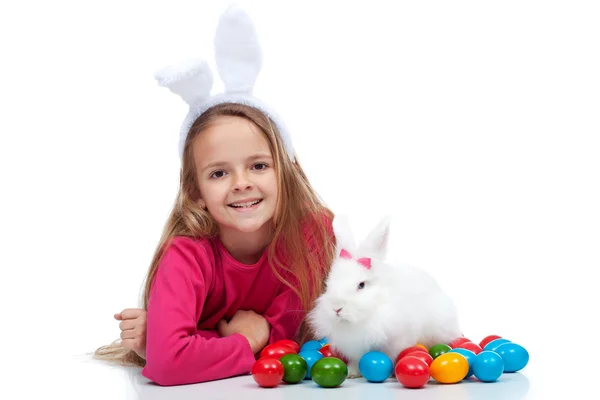 Happy girl with her easter rabbit — Stock Photo, Image
