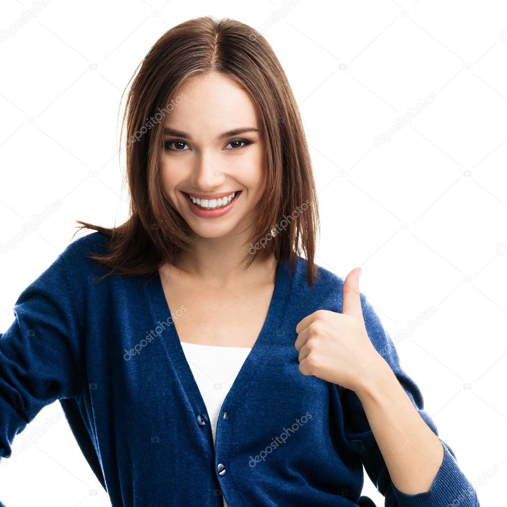 young woman showing thumbs up gesture, isolated