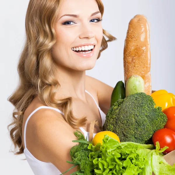 Mujer con comida vegetariana —  Fotos de Stock