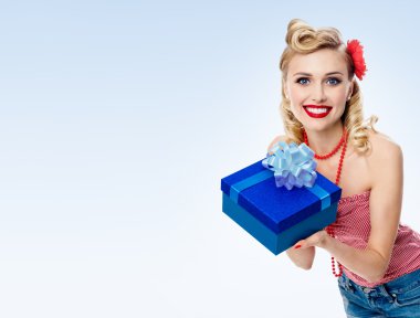 woman in pin-up style clothing with gift box clipart