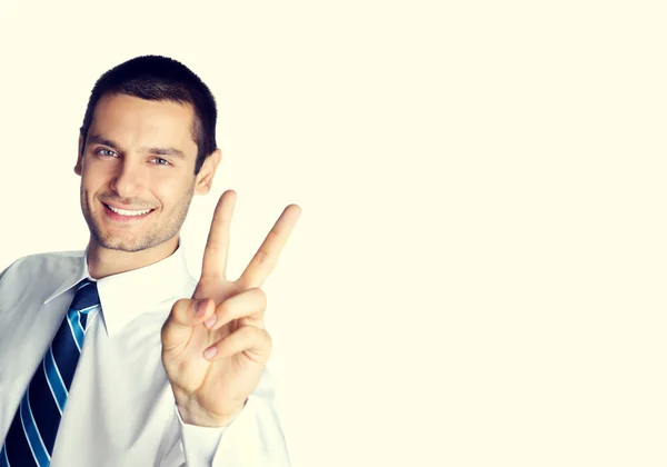 Happy smiling businessman showing two fingers — Stock Photo, Image