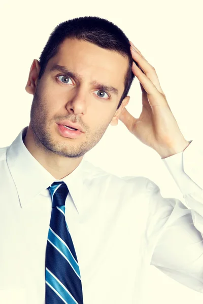 Porträt eines verwirrten jungen Geschäftsmannes — Stockfoto