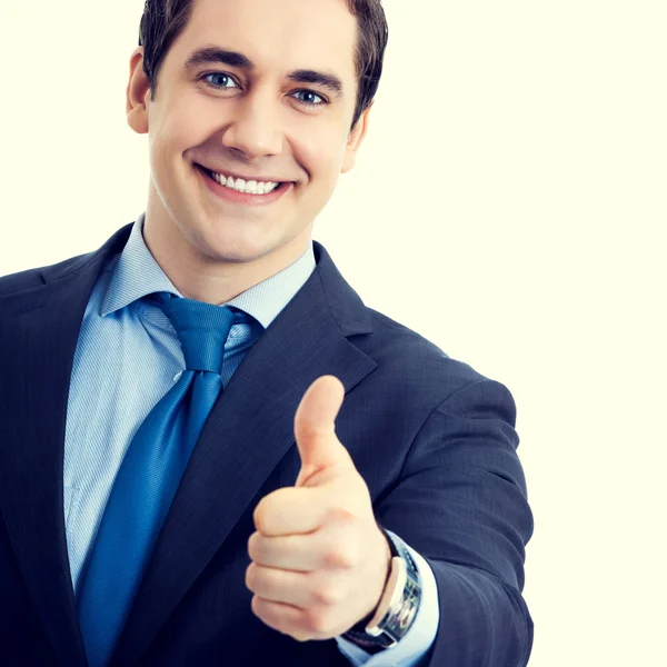 Businessman with thumbs up gesture — Stock Photo, Image