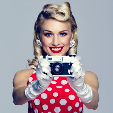woman, with no-name camera, taking picture, dressed in pin-up st clipart