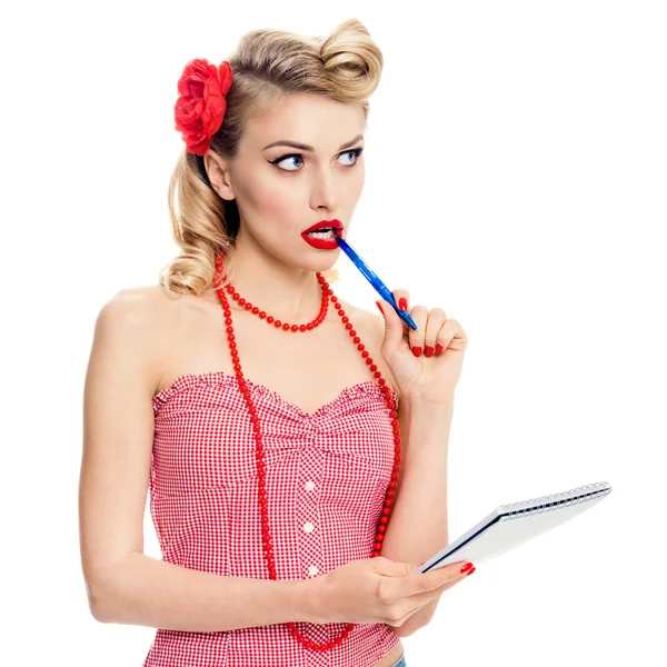 Smiling woman with notepad, in pin-up style clothing — Stock Photo, Image