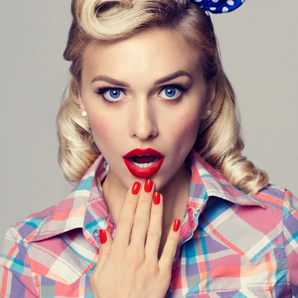 Young surprised woman, dressed in pin-up style — Stock Photo, Image