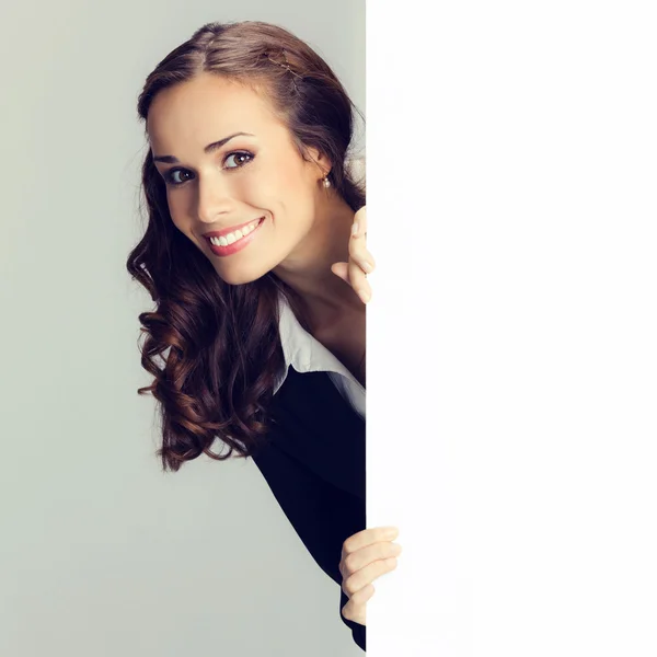 Businesswoman showing signboard — Stock Photo, Image