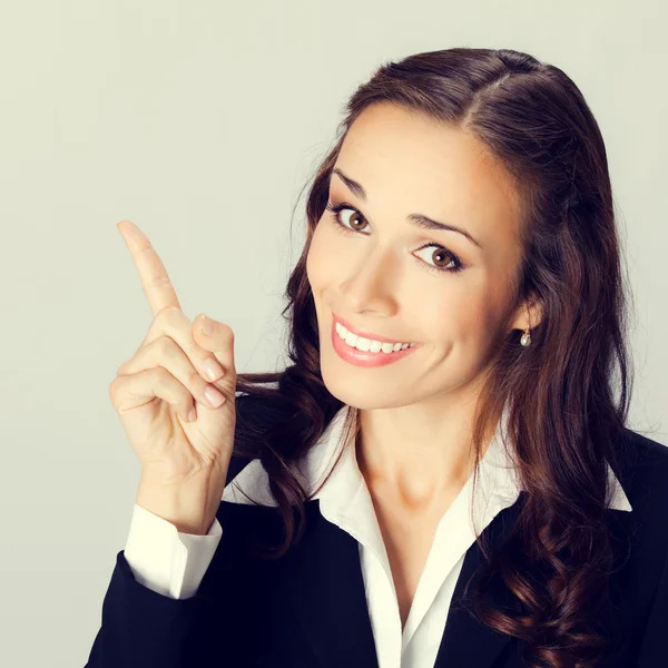 Business woman showing blank area for sign or copyspase — Stock Photo, Image