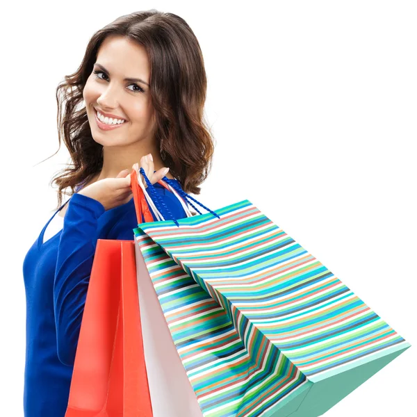 Young happy woman with shopping bags, isolated Stock Picture