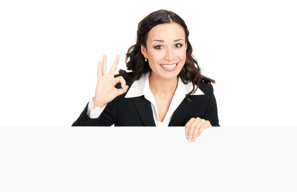 Businesswoman showing blank signboard, isolated — Stock Photo, Image