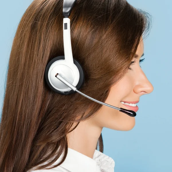 Soporte operador de teléfono en auriculares, en azul —  Fotos de Stock