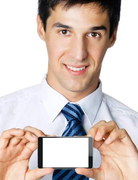 Üzletember mutatja üres cellphone vagy taplet pc — Stock Fotó