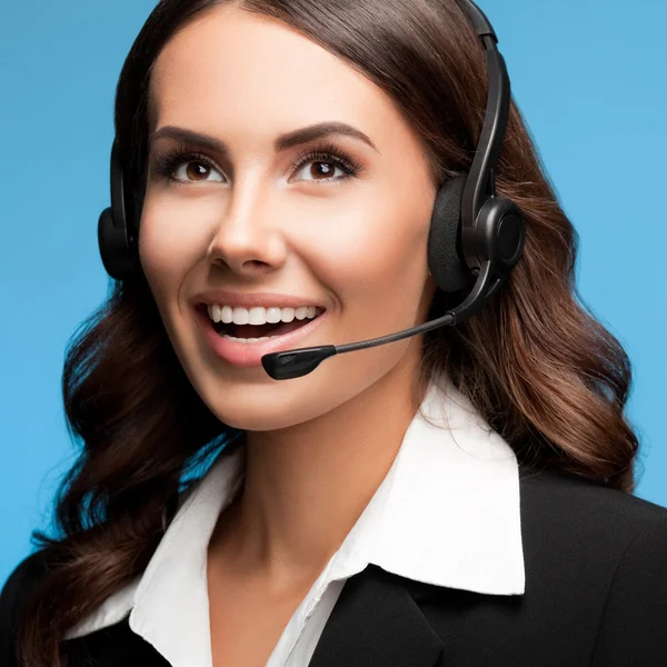 Support telefoon operator in hoofdtelefoon, op blauw — Stockfoto