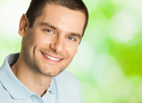 Handsome young smiling man, outdoor — Stock Photo, Image