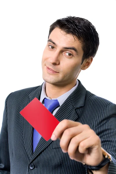 Επιχειρηματίας, δίνοντας κενό κόκκινη κάρτα, σε λευκό — Φωτογραφία Αρχείου